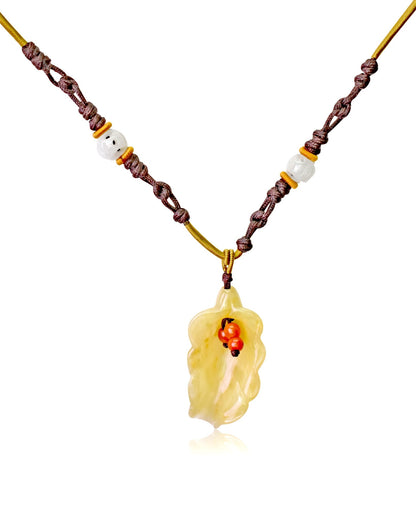 Handcrafted sweet pea necklace with jade a perfect anniversary gift bringing emotional balance and prosperity