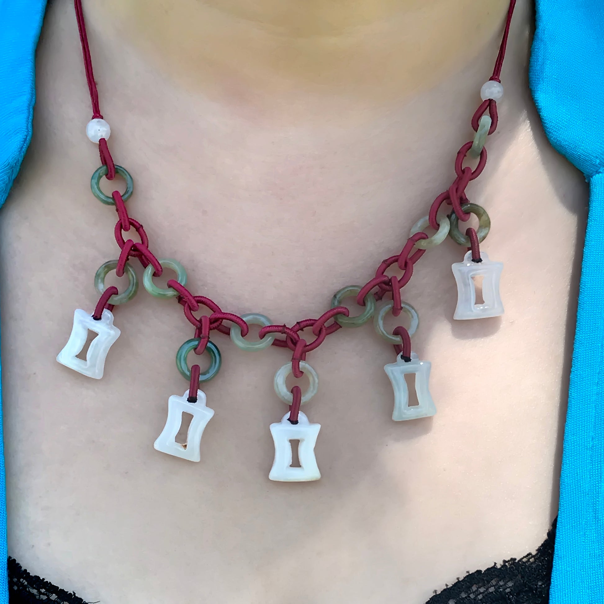 Shine Bright with a Uniquely Crafted Gemini Astrology Jade Necklace made with Maroon Cord