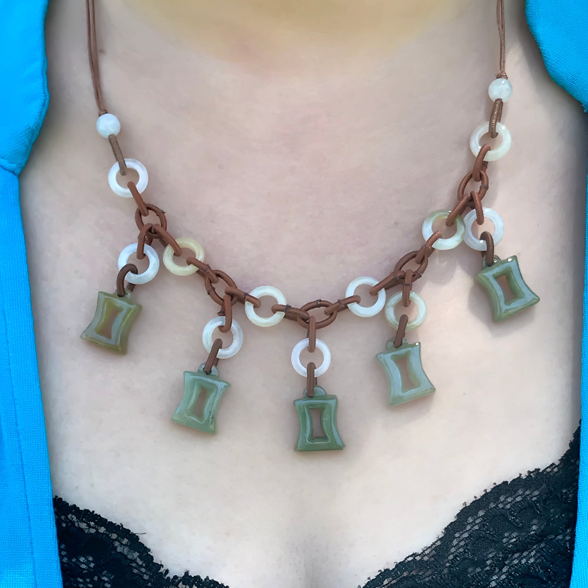 Shine Bright with a Uniquely Crafted Gemini Astrology Jade Necklace made with Brown Cord