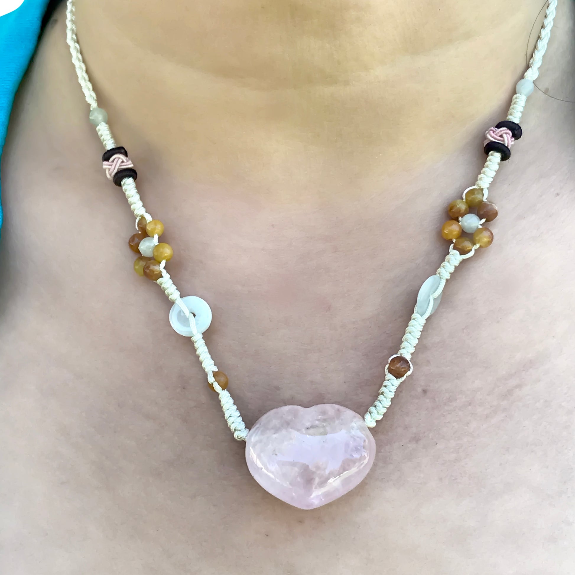 Enhance Your Style with a Rose Quartz Heart Gemstone Pendant made with White Cord