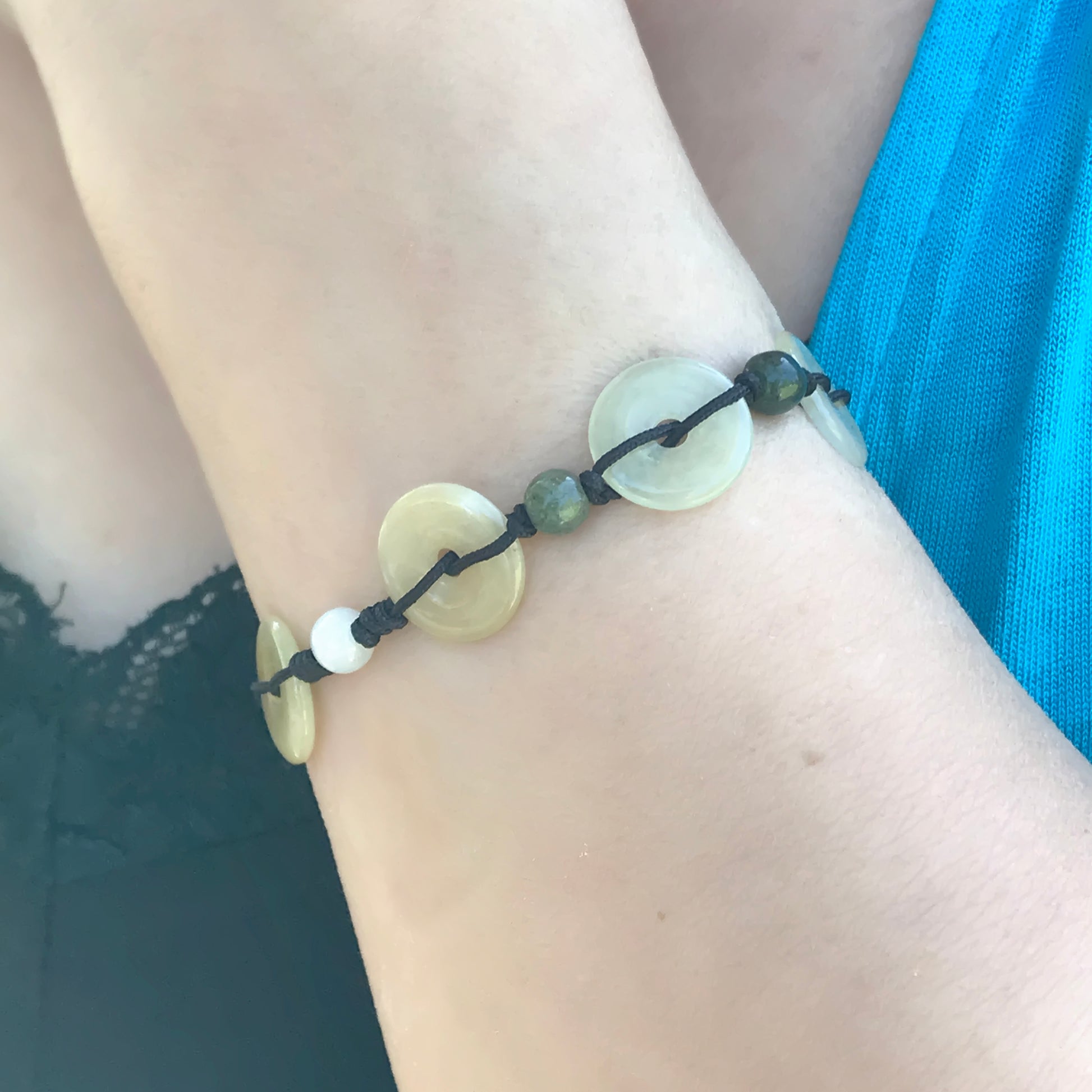 Radiate Good Energy with this Linear Eternity PI Handmade Jade Bracelet  made with Black Cord