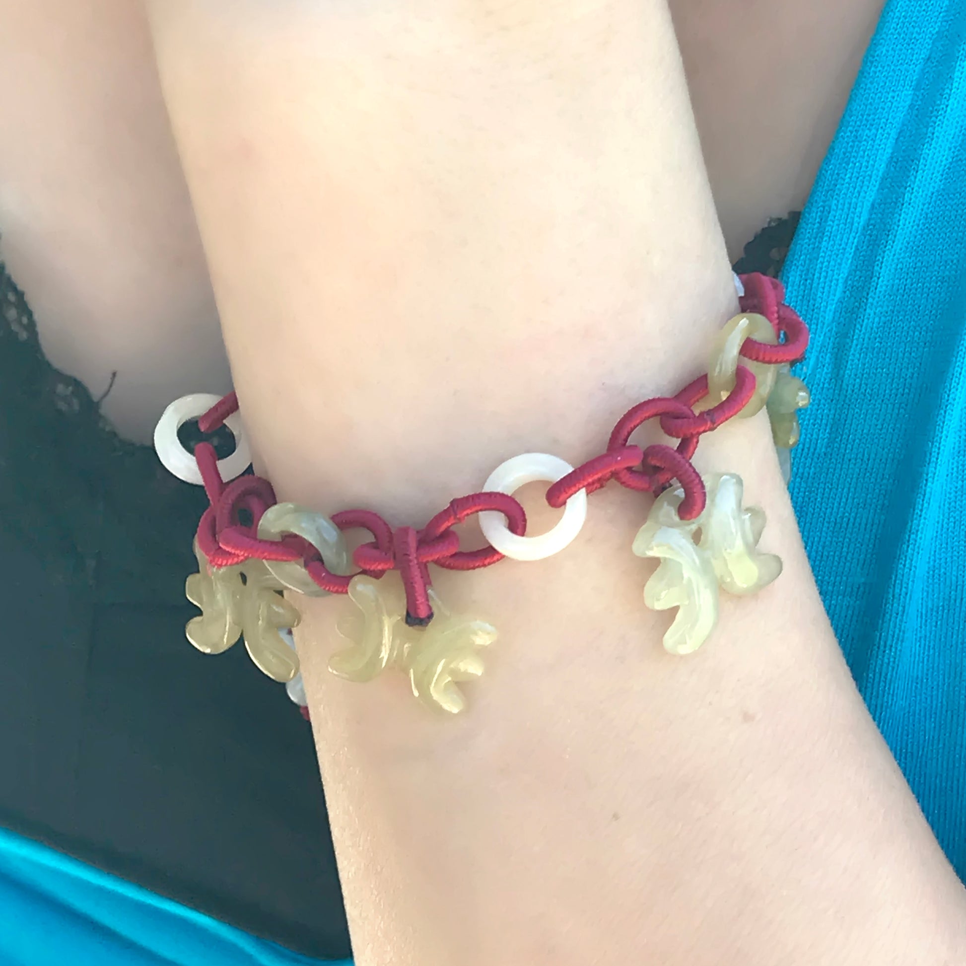 Discover the Magic of the Pisces with Our Adjustable Charm Bracelet made with Maroon Cord