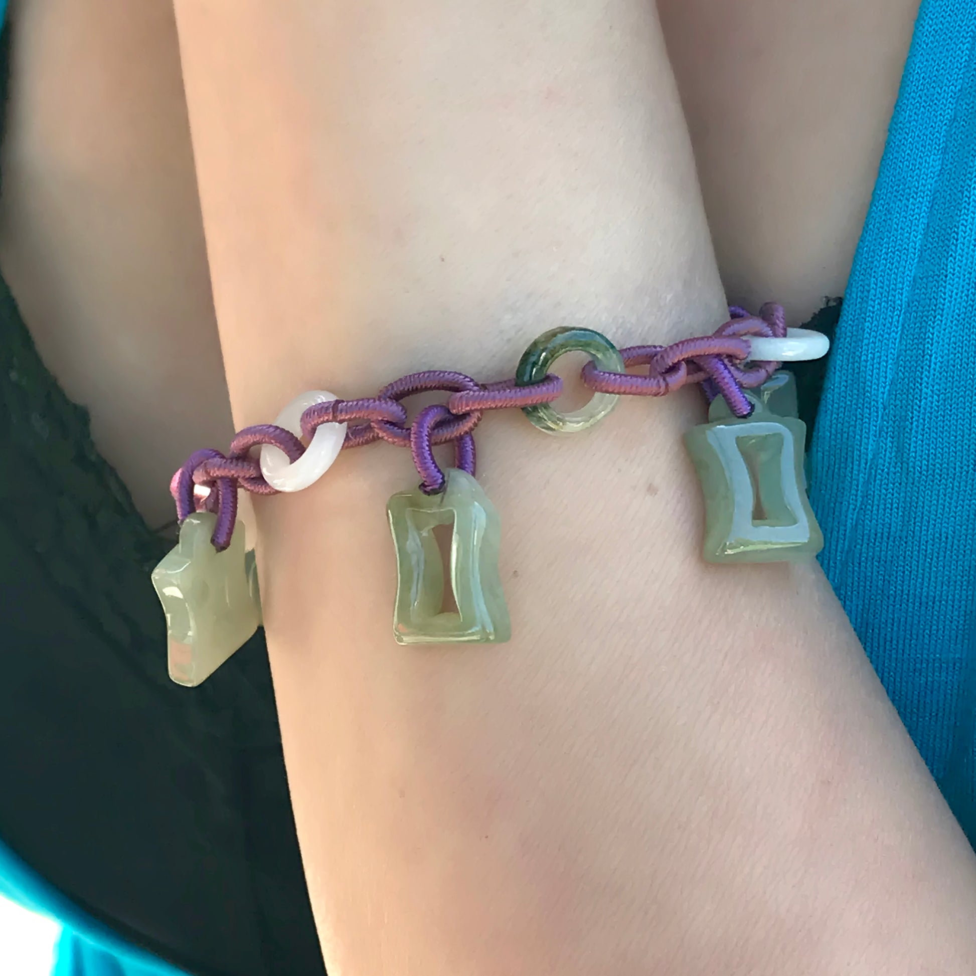 Wear the Power of Gemini Astrology Jade Bracelet Around Your Wrist made with Purple Cord