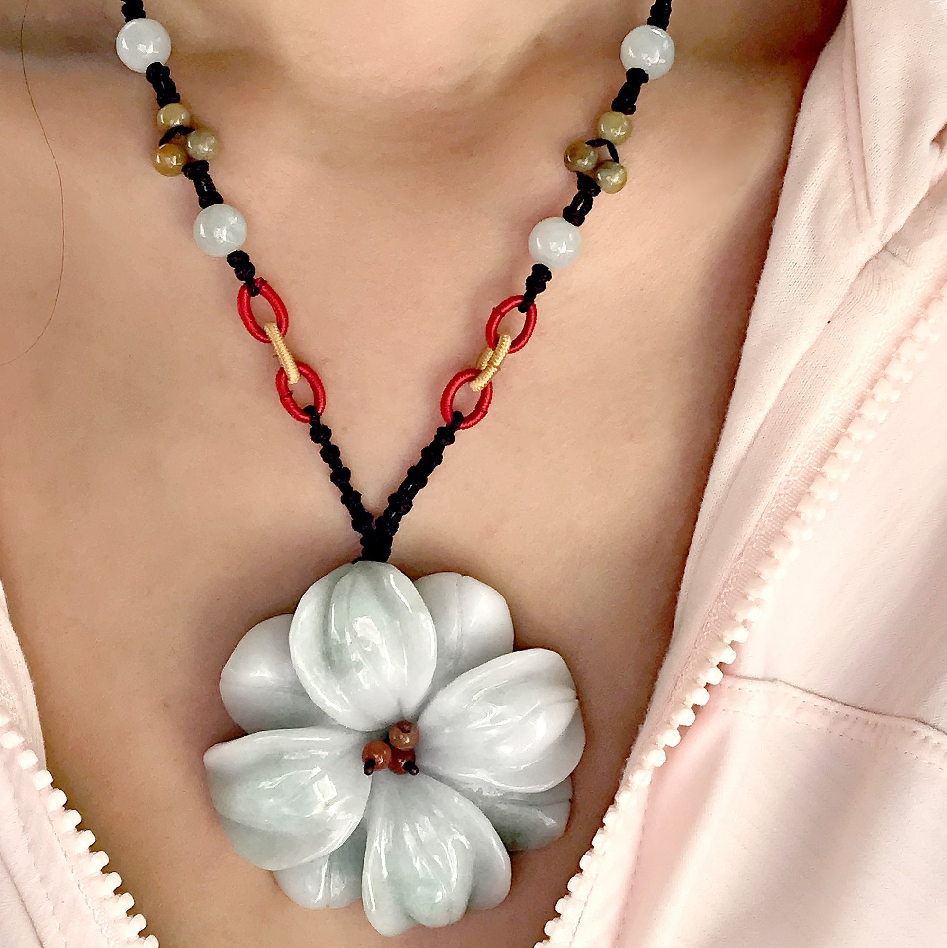 Stand Out and Shine with a Unique Dogwood Flower Jade Pendant made with Black Cord