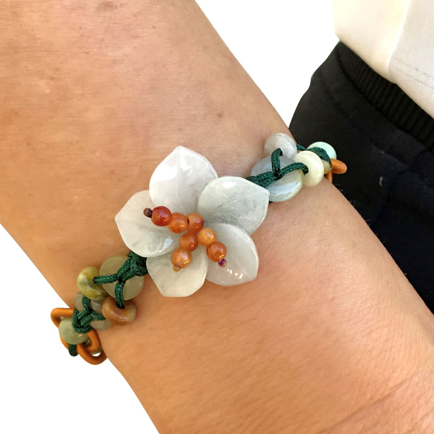 Add a Touch of Nature with this Charming Breath of Heaven Flower Jade Bracelet made with Green Cord